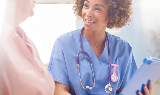 Medic discussing billing with a patient