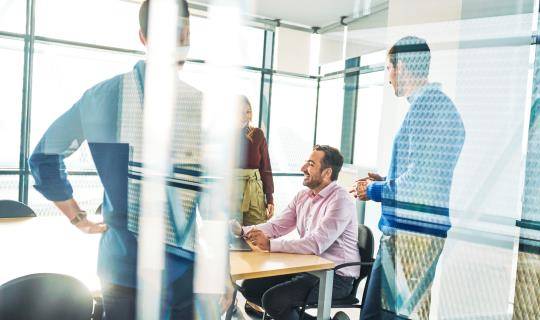 A business meeting in an office.