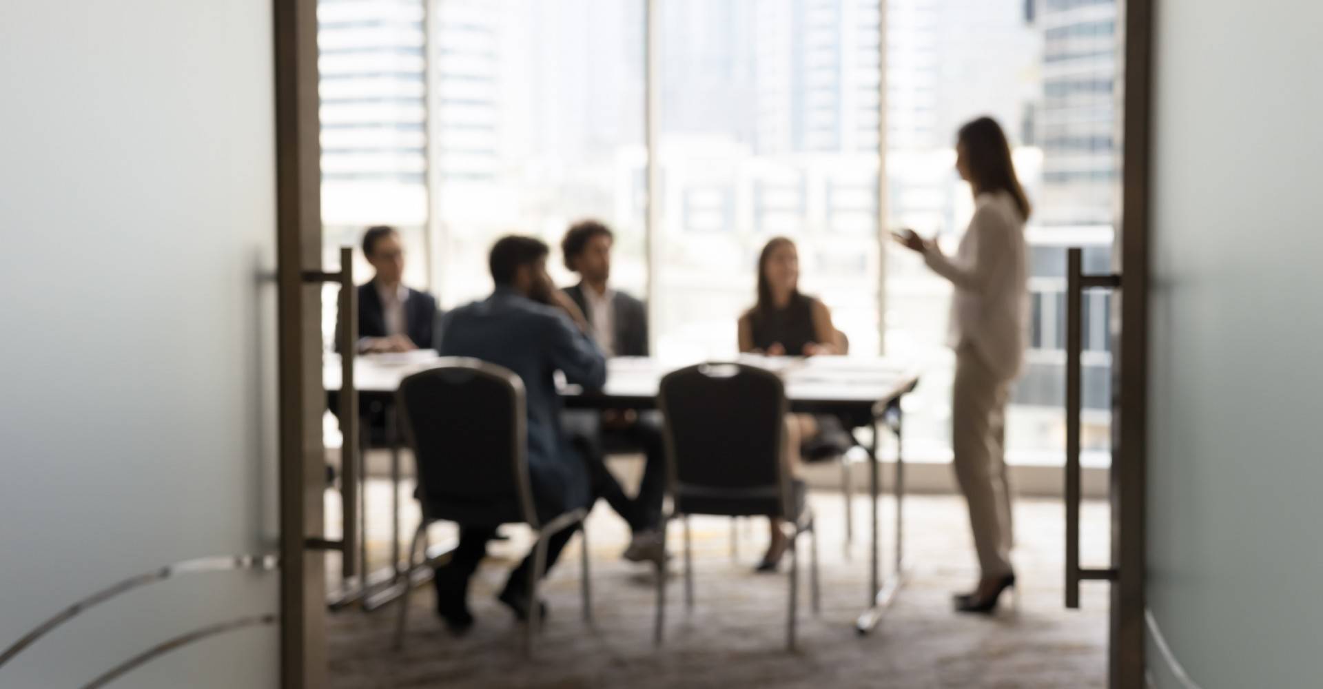 Business meeting in silhouette 