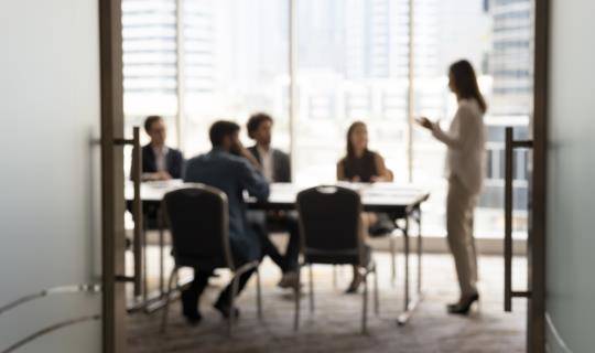 Business meeting in silhouette