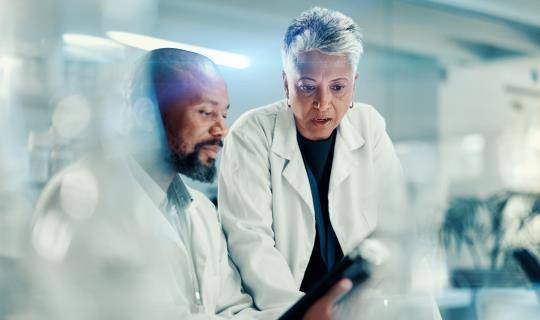 Discussion, scientists and team with tablet, lab or collaboration for medical research for analysis