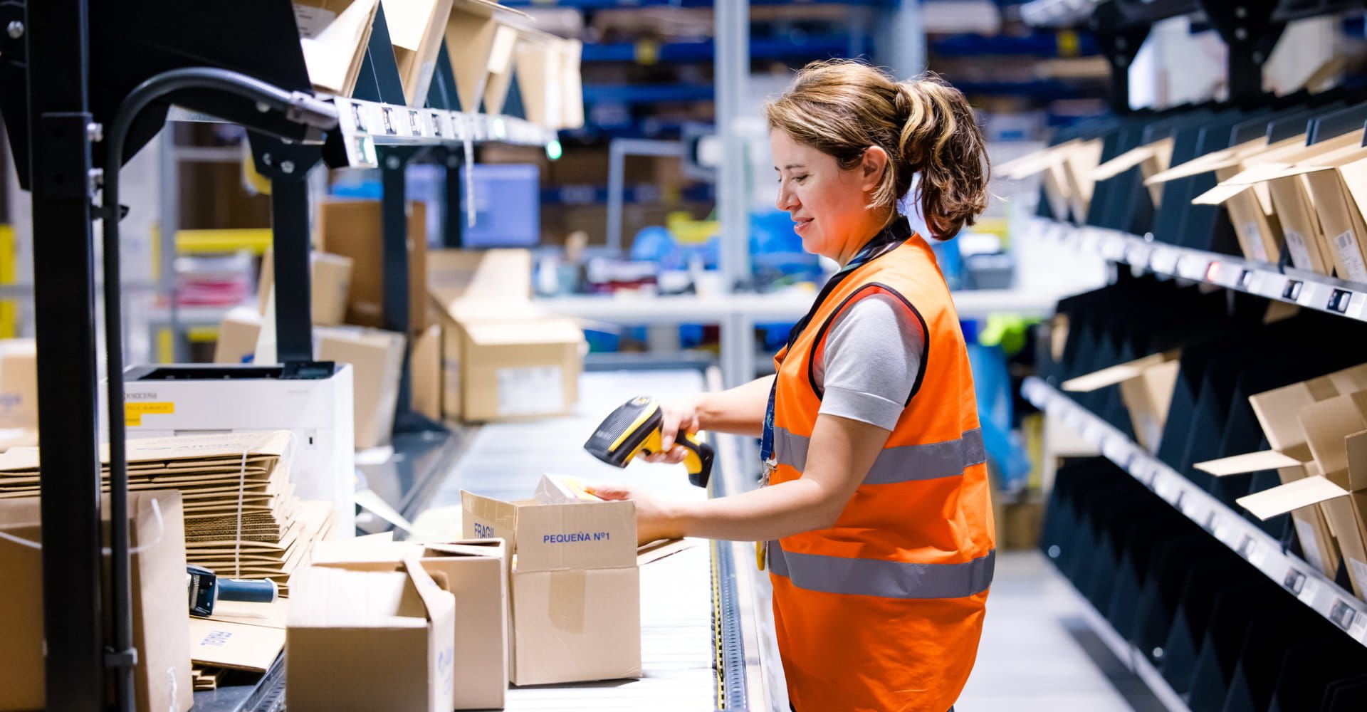 Distribution center team member preparing a shipment.
