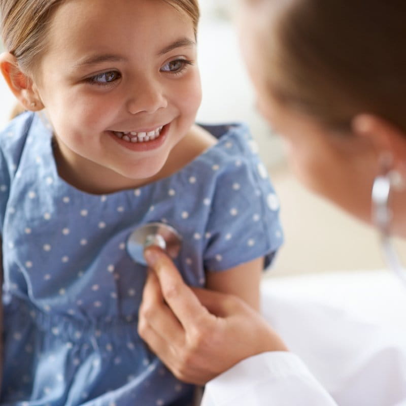 Young child visiting a doctor. 